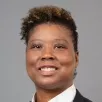 View Genesis  Fisher, Esq. Biography on their website
