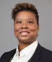View Genesis  Fisher, Esq. Biography on their website